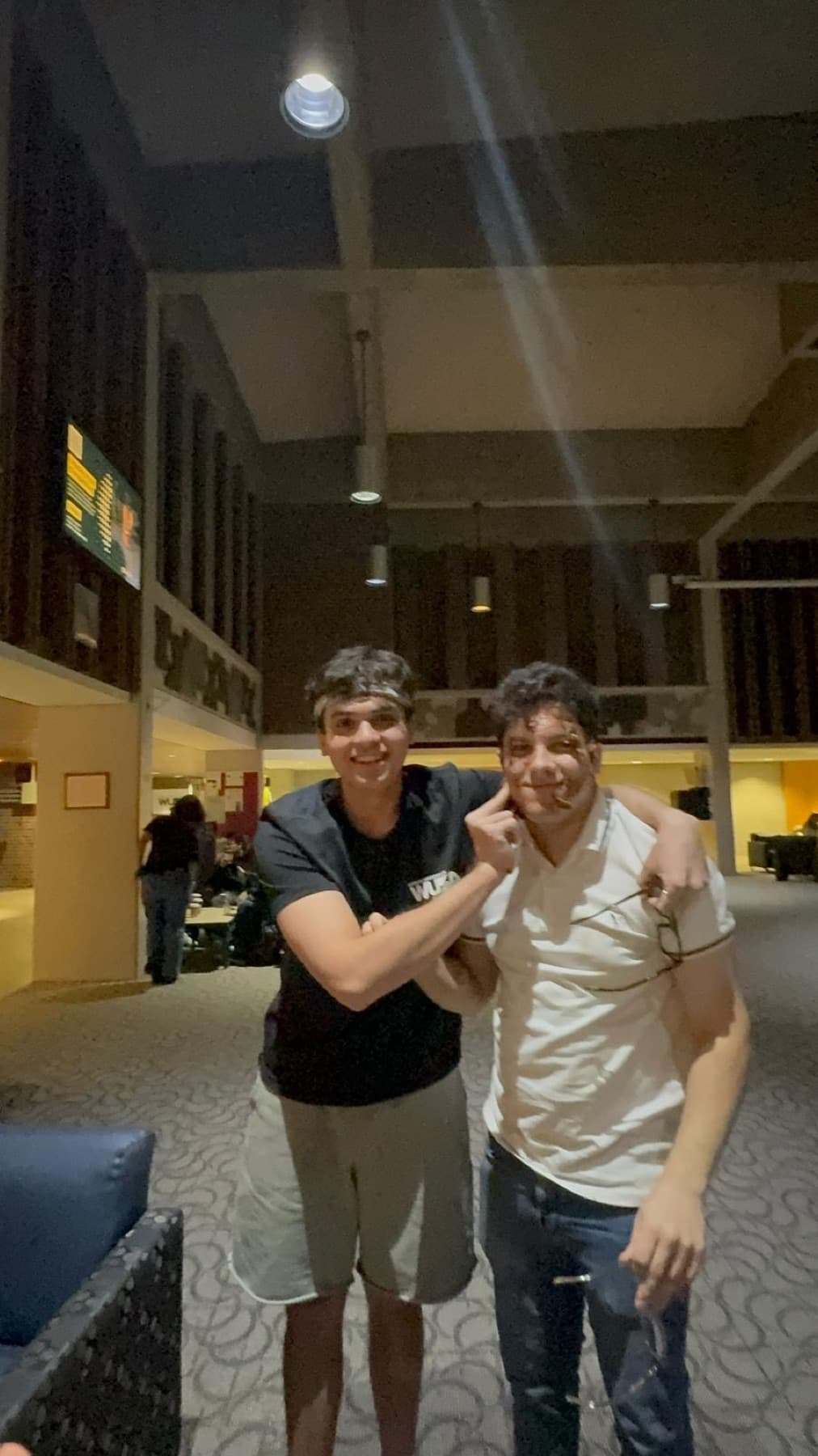 Manan with a friend at the University of Waterloo Student Life Centre