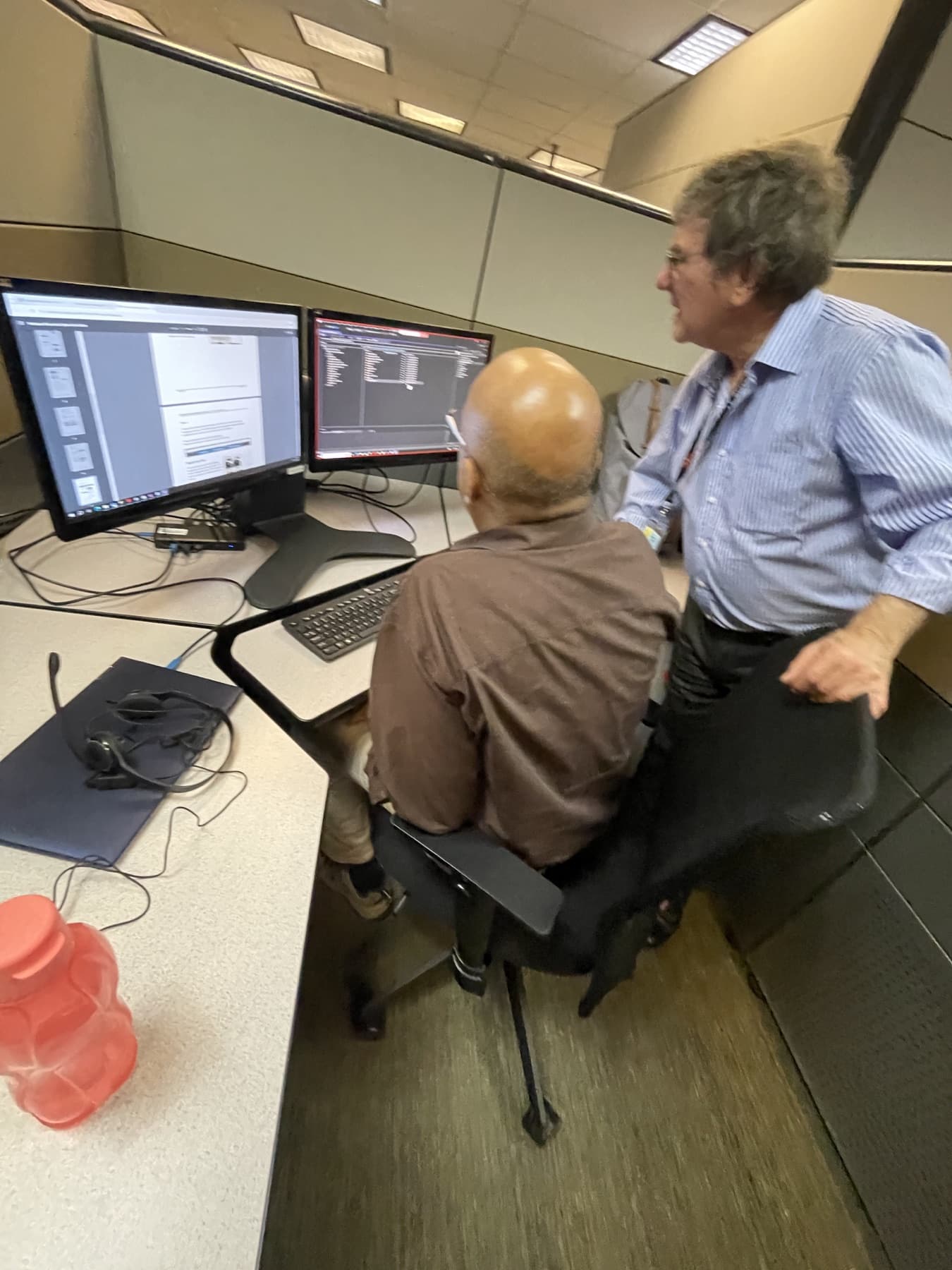 TTC colleagues collaborating at a workstation